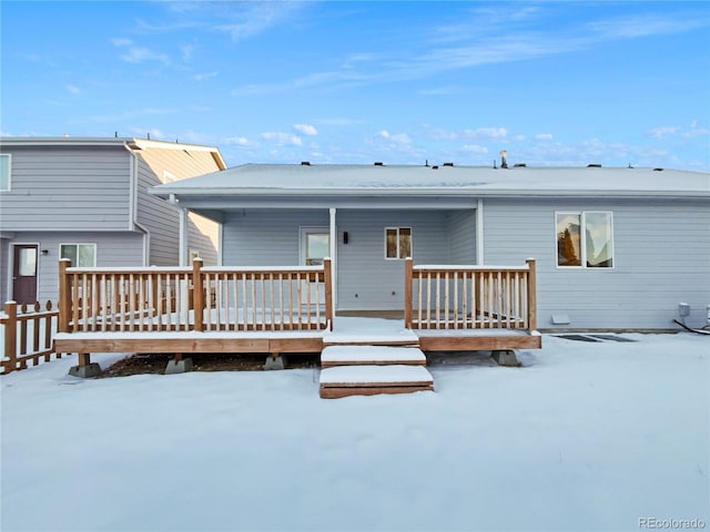 view of snow covered property