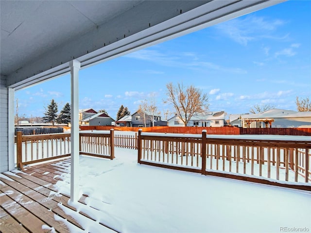 view of snow covered deck