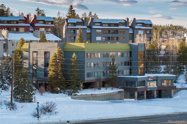 view of snow covered property