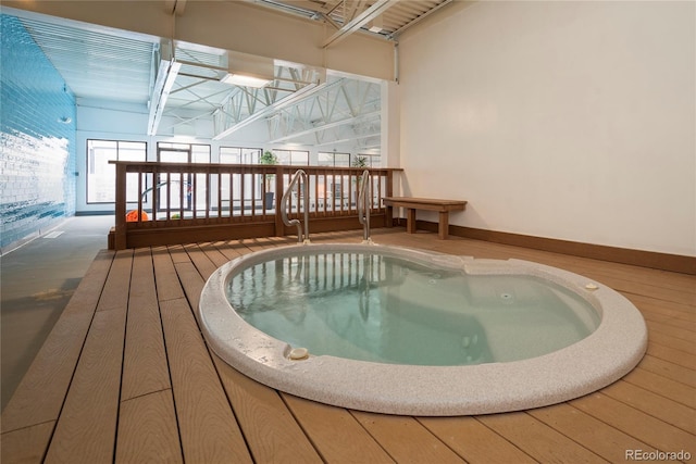 view of pool featuring a hot tub