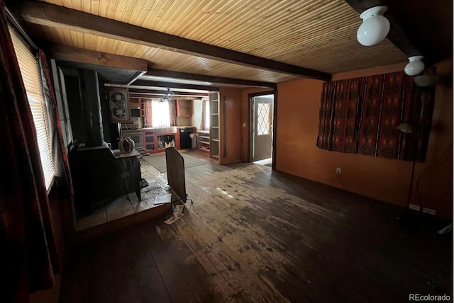 living room with beamed ceiling and dark hardwood / wood-style floors