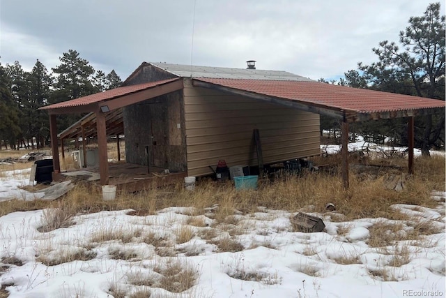 view of snow covered property