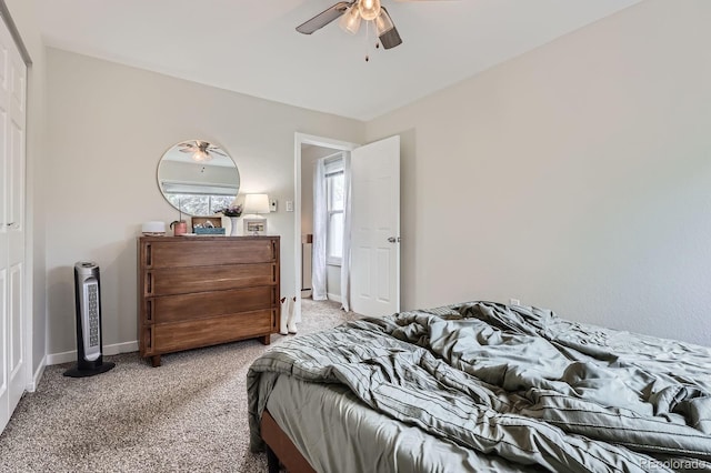 7198 Eaton Ct, Arvada, CO 80003 - bedroom with light colored carpet, baseboards, and ceiling fan