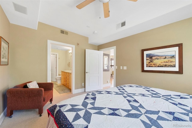1560 Milwaukee St Unit 240, Denver, CO 80206 - bedroom with light colored carpet, ensuite bathroom, baseboards, and ceiling fan