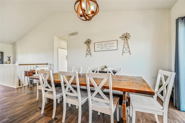 40051 Cold Iron Rd, Ramah, CO 80832 - dining room featuring a chandelier, vaulted ceiling, and wood finished floors
