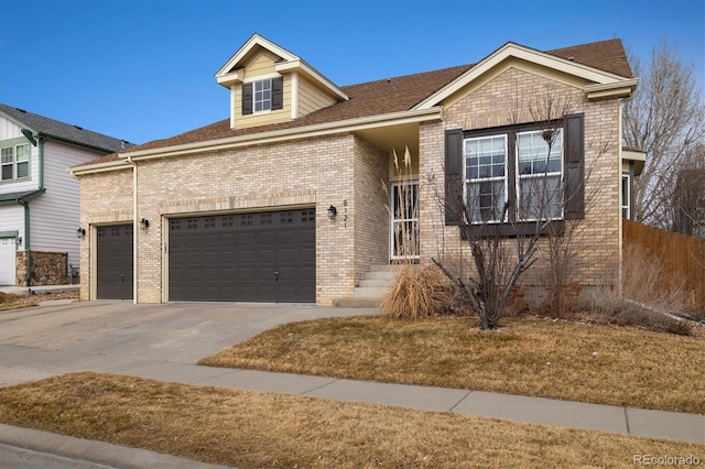 view of front of property featuring a garage