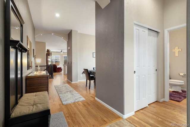 hall with light hardwood / wood-style flooring