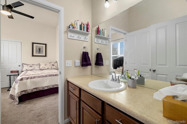 bathroom featuring ceiling fan and vanity