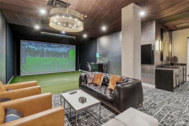 home theater room with wood ceiling, sink, golf simulator, and a notable chandelier