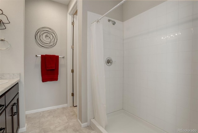 bathroom with vanity and a shower with curtain