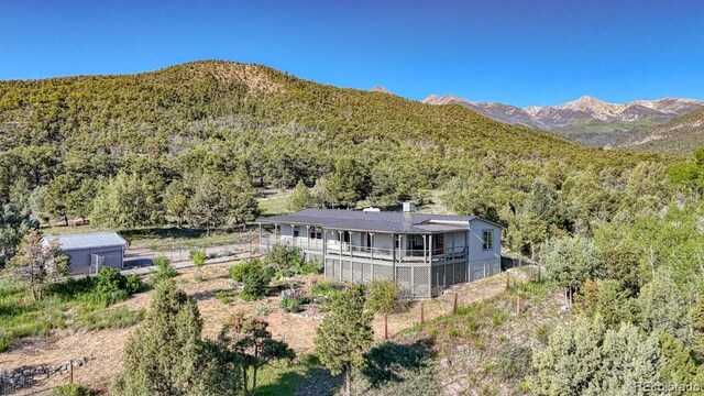 236 Boreen Way, Howard, CO 81233 - view of mountain backdrop with a heavily wooded area