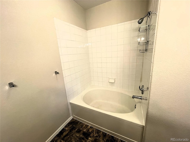 full bathroom with baseboards and shower / washtub combination