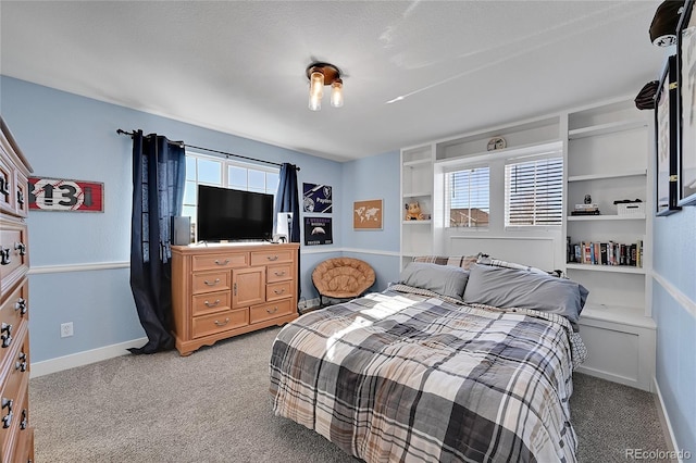 bedroom featuring light carpet