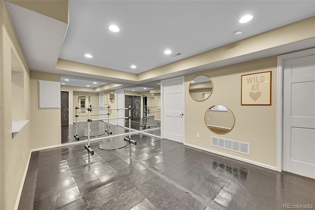 interior space with visible vents, baseboards, and recessed lighting