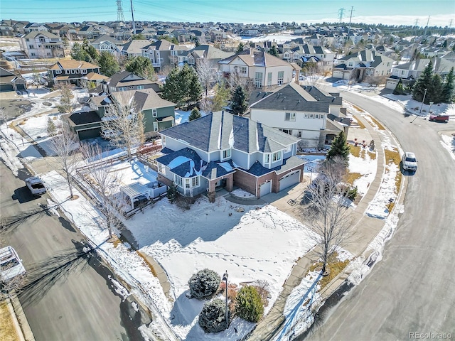 birds eye view of property with a residential view