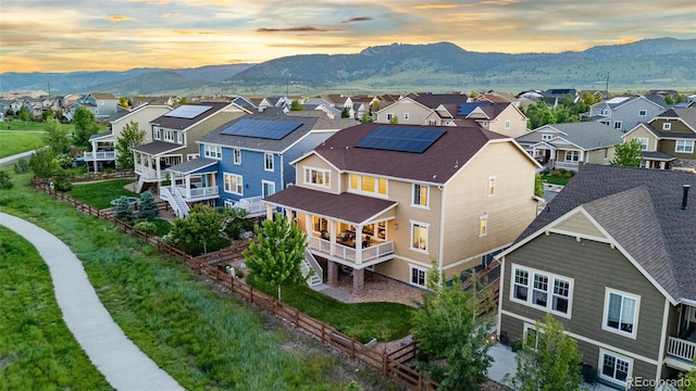 19894 W 94th Ln, Arvada, CO 80007 - aerial view of residential area with a mountain backdrop
