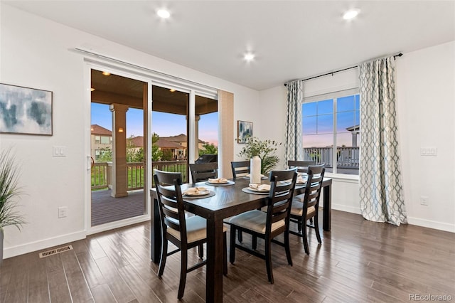 19894 W 94th Ln, Arvada, CO 80007 - dining space featuring dark wood-style flooring, healthy amount of natural light, and recessed lighting