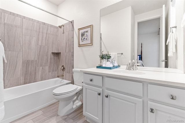 19894 W 94th Ln, Arvada, CO 80007 - bathroom featuring vanity, bathtub / shower combination, and wood finished floors
