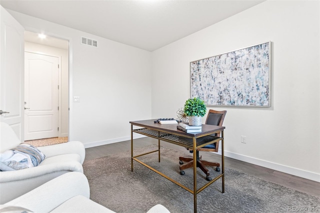 19894 W 94th Ln, Arvada, CO 80007 - office area with dark wood-style flooring and baseboards
