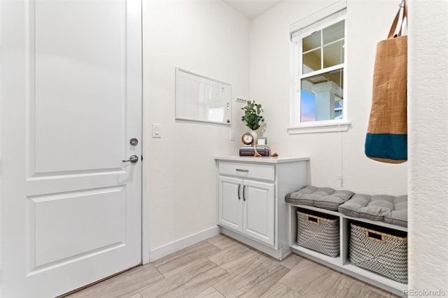 19894 W 94th Ln, Arvada, CO 80007 - mudroom featuring baseboards