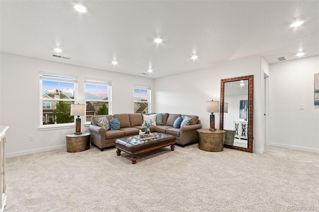 19894 W 94th Ln, Arvada, CO 80007 - carpeted living room with baseboards and recessed lighting