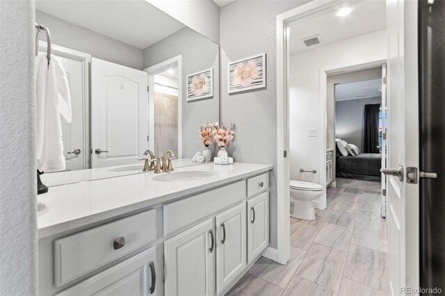 19894 W 94th Ln, Arvada, CO 80007 - full bath featuring vanity and ensuite bathroom