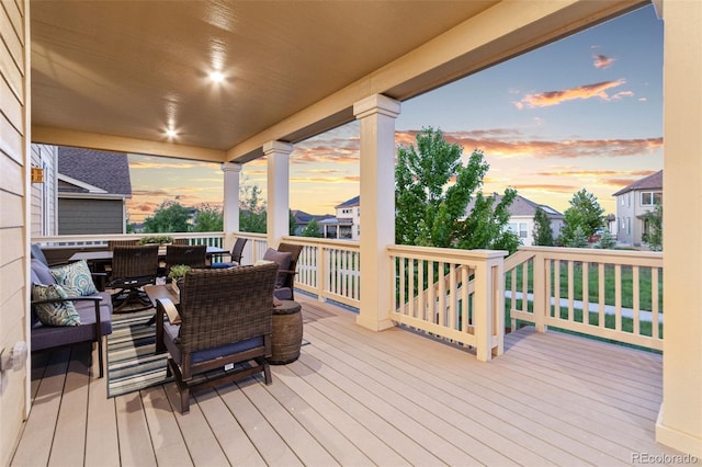 19894 W 94th Ln, Arvada, CO 80007 - deck at dusk with outdoor dining area