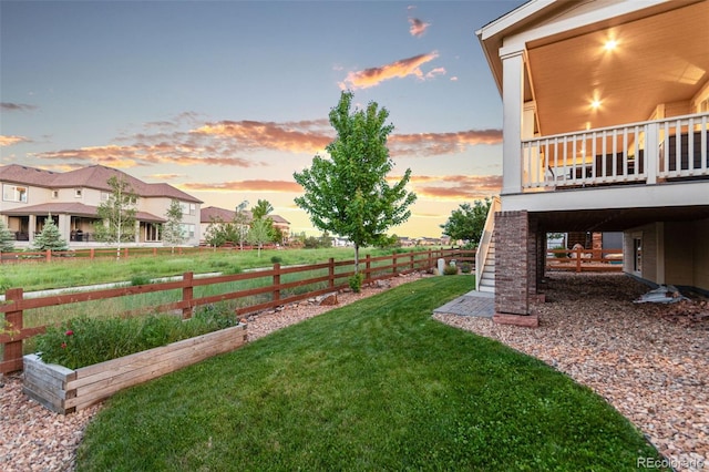 19894 W 94th Ln, Arvada, CO 80007 - view of yard with a deck and stairway