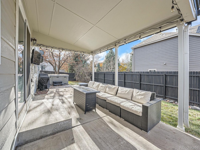 view of patio / terrace with an outdoor hangout area, area for grilling, and a hot tub