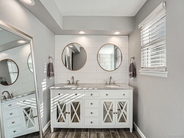 bathroom featuring vanity and hardwood / wood-style flooring