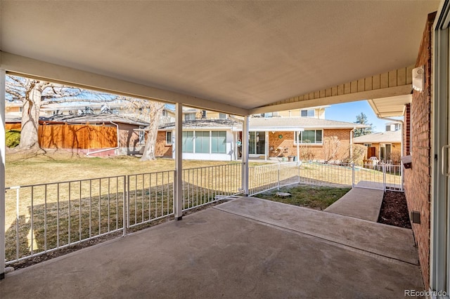 view of patio / terrace featuring fence