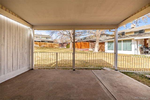 view of patio / terrace featuring fence