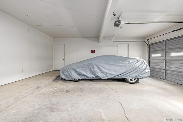 garage featuring a garage door opener