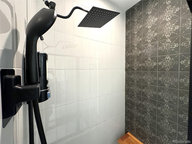 interior space with tiled shower