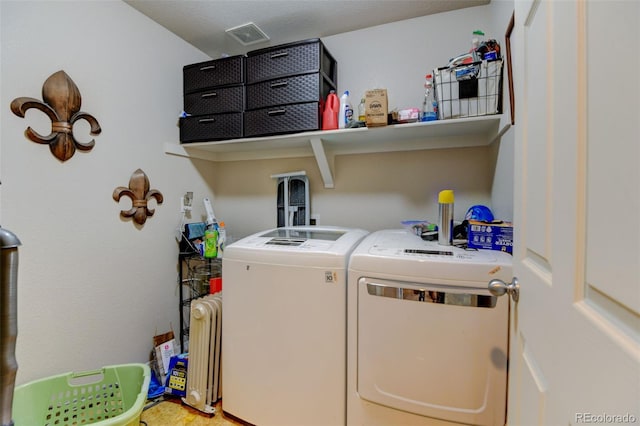 laundry area featuring independent washer and dryer