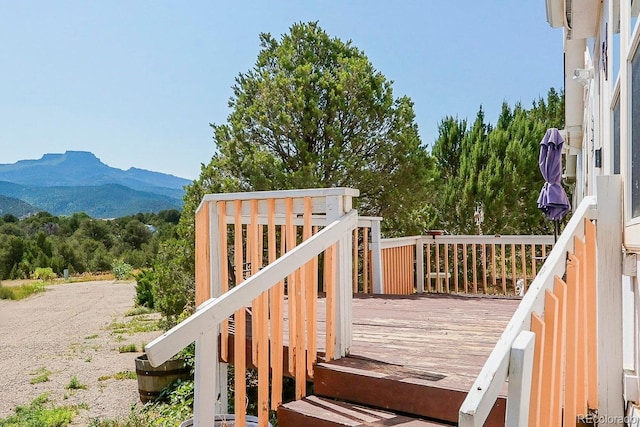 wooden terrace with a mountain view