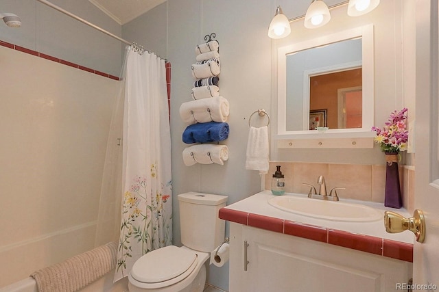 full bathroom featuring shower / bath combination with curtain, vanity, tasteful backsplash, and toilet