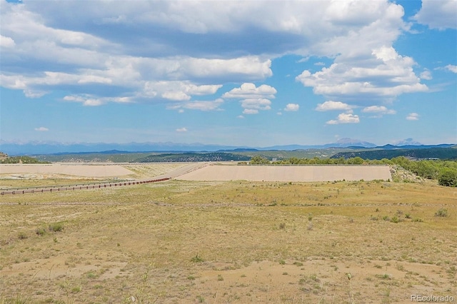 property view of mountains with a rural view