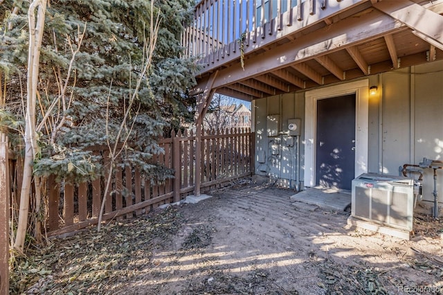 view of patio with a deck and central AC unit