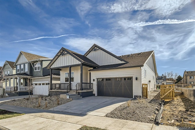 view of front of home featuring covered porch and a garage