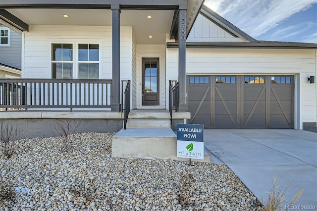 doorway to property featuring a garage