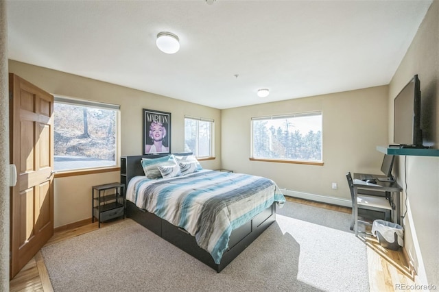 bedroom featuring light wood-type flooring