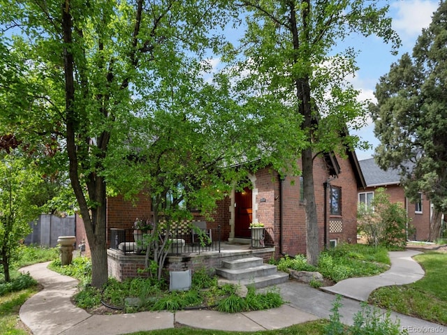 405 S University Blvd, Denver, CO 80209 - view of property hidden behind natural elements featuring brick siding