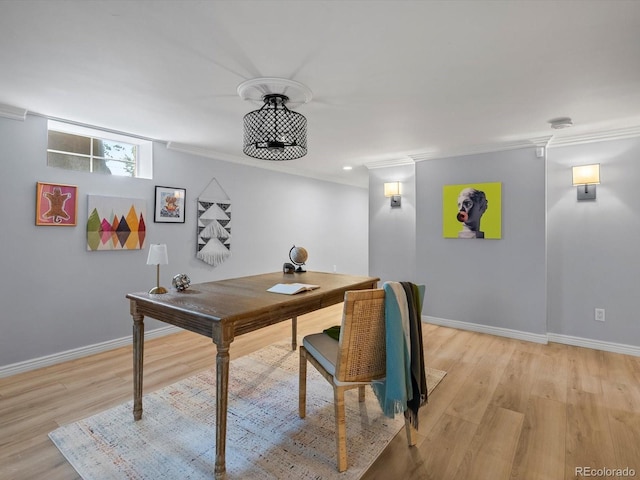 405 S University Blvd, Denver, CO 80209 - home office with crown molding, baseboards, and light wood-type flooring