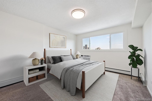 1029 E 8th Ave Unit 603, Denver, CO 80218 - bedroom featuring baseboard heating, carpet floors, a textured ceiling, and an AC wall unit