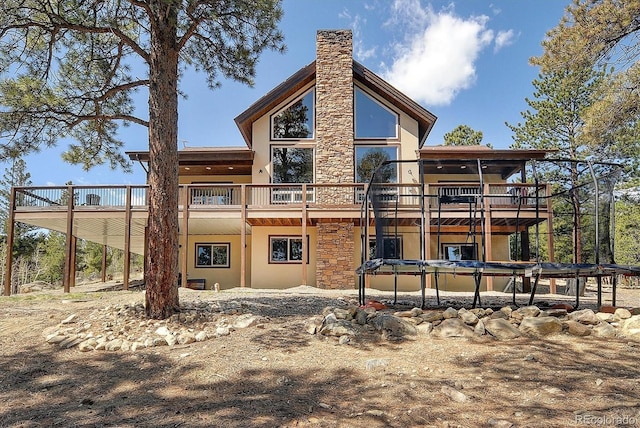 30220 Columbia Pt, Buena Vista, CO 81211 - rear view of property with a deck and stucco siding