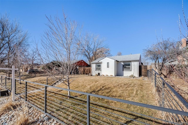 view of yard with a fenced backyard