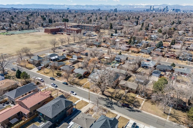 birds eye view of property with a residential view and a mountain view