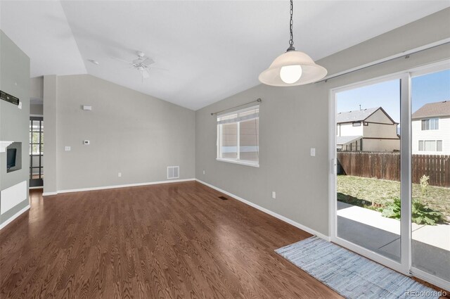 3456 Osprey Ridge Dr, Colorado Springs, CO 80916 - unfurnished living room with a ceiling fan, wood finished floors, lofted ceiling, and baseboards