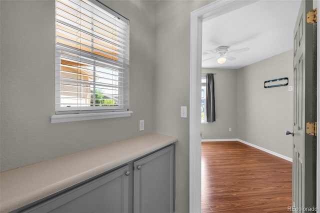 3456 Osprey Ridge Dr, Colorado Springs, CO 80916 - corridor featuring dark wood-style flooring and baseboards
